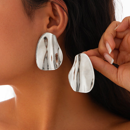 Sculptural Statement Earrings | Hollow Heart & Molten Drop