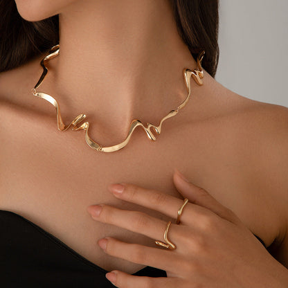 Liquid Lava Necklace and Ring Set Gold - full wave choker with matching wave ring, black top editorial