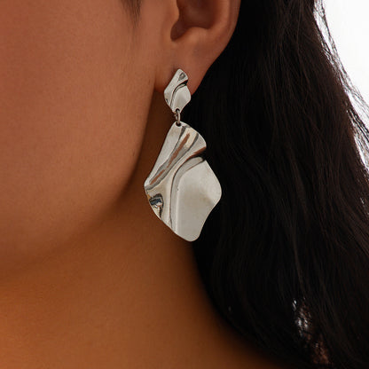 Sculptural Statement Earrings | Hollow Heart & Molten Drop